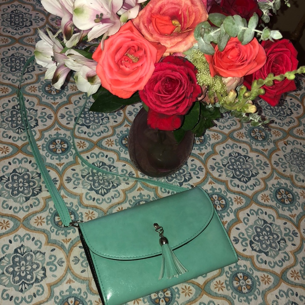 Turquoise purse with adjustable strap!